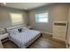 Spacious bedroom with queen bed and large dresser at 1809 Southwood St, Sarasota, FL 34231