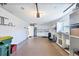 Spacious garage with workshop area, cabinets, and laundry hookups at 2110 Hawthorne St, Sarasota, FL 34239