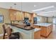 Modern kitchen featuring granite countertops, stainless steel appliances, and an island at 2110 Hawthorne St, Sarasota, FL 34239