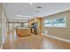 Open concept kitchen with island and tile flooring, flows into adjacent living area at 2110 Hawthorne St, Sarasota, FL 34239