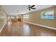 Open living space with tile floors, offering views of the kitchen and backyard at 2110 Hawthorne St, Sarasota, FL 34239