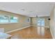 Large living room with tile floors and plenty of natural light from large windows at 2110 Hawthorne St, Sarasota, FL 34239