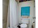 Clean bathroom with shower stall, toilet, and a towel rack at 2901 26Th W St # 818, Bradenton, FL 34205