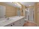 Bathroom with double vanity, shower, and tiled floor at 3115 Live Oak Ln # 30, Palmetto, FL 34221