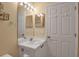 Small bathroom with single vanity and built-in shelving at 3115 Live Oak Ln # 30, Palmetto, FL 34221