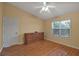 Spacious bedroom with laminate wood floor and large dresser at 3115 Live Oak Ln # 30, Palmetto, FL 34221