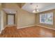Dining room with hardwood floors and access to the living room at 3115 Live Oak Ln # 30, Palmetto, FL 34221