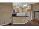 Kitchen with granite countertop and gray cabinets at 3115 Live Oak Ln # 30, Palmetto, FL 34221