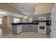 Updated kitchen features gray cabinets and granite countertops at 3115 Live Oak Ln # 30, Palmetto, FL 34221