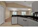 Kitchen with granite countertops, gray cabinets and a dishwasher at 3115 Live Oak Ln # 30, Palmetto, FL 34221