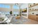 Open concept living area with large windows and water views at 3460 Mistletoe Ln, Longboat Key, FL 34228