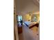 Main bedroom with king-size bed and access to patio at 3500 El Conquistador Pkwy # 331, Bradenton, FL 34210
