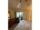 Bedroom with water view, dresser, and comfortable seating at 3500 El Conquistador Pkwy # 331, Bradenton, FL 34210
