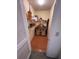 Small storage closet with shelves and wicker chairs at 3500 El Conquistador Pkwy # 331, Bradenton, FL 34210