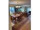 Dining room with wood table and chairs, hardwood floors at 3500 El Conquistador Pkwy # 331, Bradenton, FL 34210