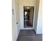 Condo entryway with view into living area and hardwood floors at 3500 El Conquistador Pkwy # 331, Bradenton, FL 34210