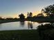 Stunning sunset view over the golf course and pond at 3500 El Conquistador Pkwy # 331, Bradenton, FL 34210