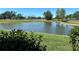 Peaceful view of the golf course and pond from the property at 3500 El Conquistador Pkwy # 331, Bradenton, FL 34210