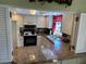 Kitchen with granite countertops and black appliances at 3500 El Conquistador Pkwy # 331, Bradenton, FL 34210