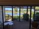 Spacious lanai overlooking a serene golf course and lake at 3500 El Conquistador Pkwy # 331, Bradenton, FL 34210