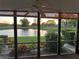 Relaxing screened lanai with golf course and pond view at 3500 El Conquistador Pkwy # 331, Bradenton, FL 34210