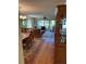 Living room with view of lake from sliding glass doors at 3500 El Conquistador Pkwy # 331, Bradenton, FL 34210