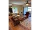 Living room with comfy seating and hardwood floors at 3500 El Conquistador Pkwy # 331, Bradenton, FL 34210