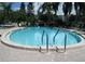Inviting community pool with plenty of lounge chairs at 3820 Ironwood Ln # 106-I, Bradenton, FL 34209