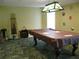 Relaxing game room featuring a pool table and comfortable seating at 3820 Ironwood Ln # 106-I, Bradenton, FL 34209