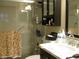 Bathroom with shower, vanity, and medicine cabinet at 3820 Ironwood Ln # 106-I, Bradenton, FL 34209