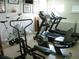 Well-equipped fitness center with treadmills and exercise bikes at 3820 Ironwood Ln # 106-I, Bradenton, FL 34209