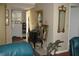 Bright entryway with decorative accents and wine storage at 3820 Ironwood Ln # 106-I, Bradenton, FL 34209