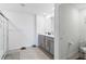 Clean bathroom with shower and double vanity at 5058 Granite Dust Pl, Palmetto, FL 34221