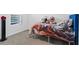 Small bedroom with a twin bed and colorful bedding at 5058 Granite Dust Pl, Palmetto, FL 34221