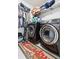 Laundry room with washer, dryer and shelving at 5058 Granite Dust Pl, Palmetto, FL 34221