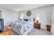 Bedroom with king-size bed and wood dresser at 5855 Midnight Pass Rd # 404, Sarasota, FL 34242