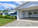 House exterior with carport and landscaping at 6079 Coral Way, Bradenton, FL 34207