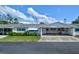 Community view showing multiple houses and landscaping at 6079 Coral Way, Bradenton, FL 34207