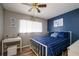 Bedroom with a queen bed and a desk at 6079 Coral Way, Bradenton, FL 34207