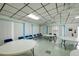 Community room with tables and chairs, ideal for meetings or gatherings at 6079 Coral Way, Bradenton, FL 34207