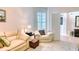 Relaxing living room with comfy seating and natural light at 8115 Stirling Falls Cir, Sarasota, FL 34243