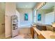 Spa-like bathroom with double vanity and a soaking tub at 8115 Stirling Falls Cir, Sarasota, FL 34243