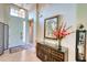 Inviting entryway showcasing a decorative console table and art at 8115 Stirling Falls Cir, Sarasota, FL 34243