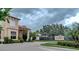 Gated community entrance to Lakeridge Falls with water feature at 8115 Stirling Falls Cir, Sarasota, FL 34243