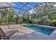 Inviting screened pool and spa with ample deck space at 11414 Hawick Pl, Lakewood Ranch, FL 34202