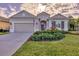 Charming one-story home with a well-manicured lawn and attractive facade at 12706 Lake Silver Ave, Bradenton, FL 34211