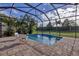 Enjoy this private, screened-in pool and patio area at 12706 Lake Silver Ave, Bradenton, FL 34211