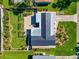 Single story home with expansive backyard and landscaping at 138 Paddington Rd, Venice, FL 34293