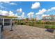 Large backyard with pergola, patio, and lush landscaping at 138 Paddington Rd, Venice, FL 34293