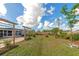 Large backyard with firepit and garden at 138 Paddington Rd, Venice, FL 34293